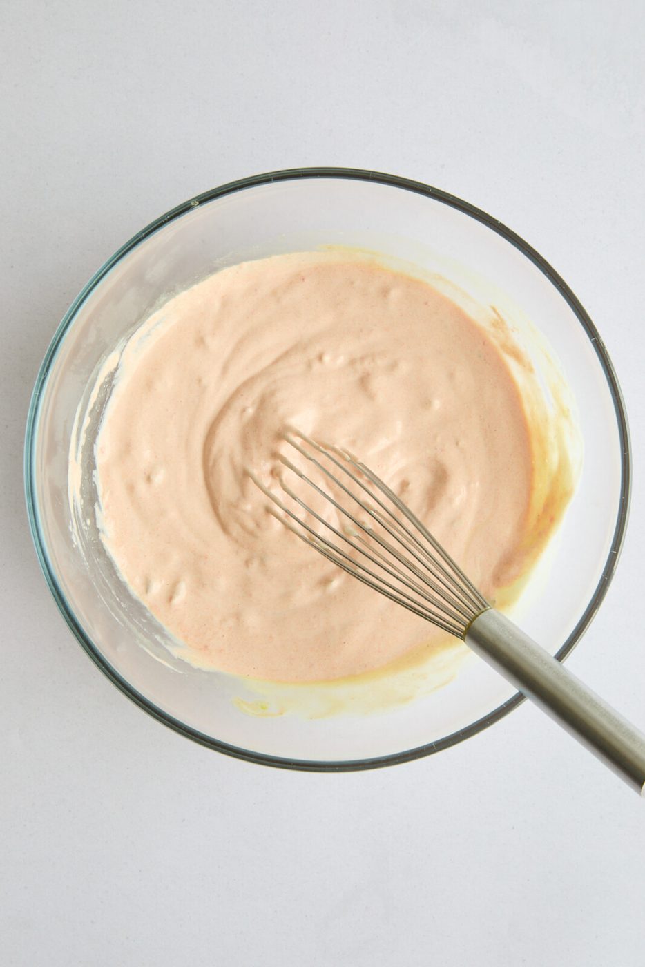 The mixed sauce in a bowl that's set aside. 