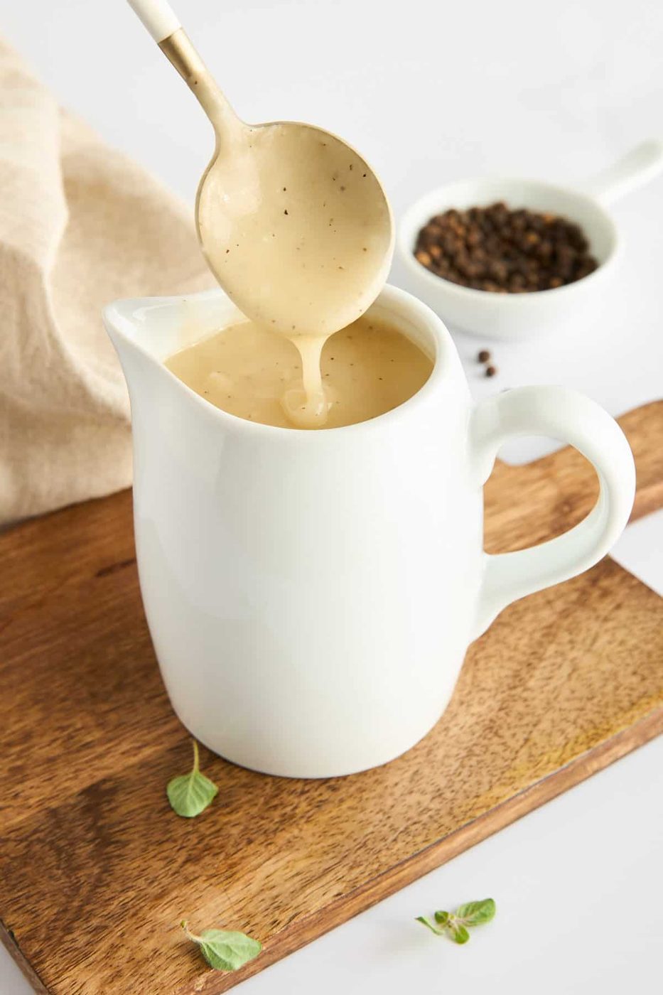 My Easy Gravy featured in a white ceramic gravy pot. 