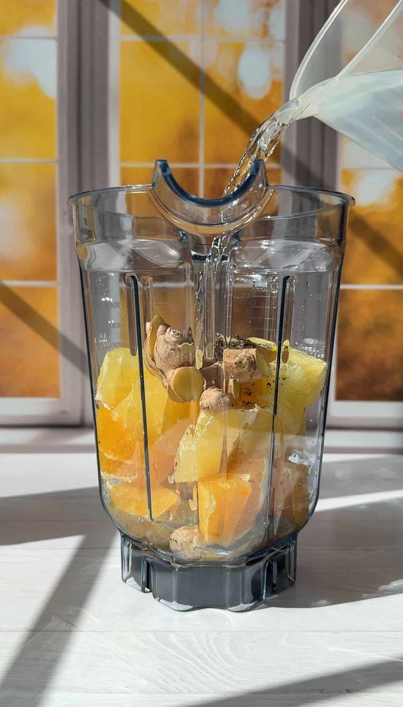 Adding water to the blender
