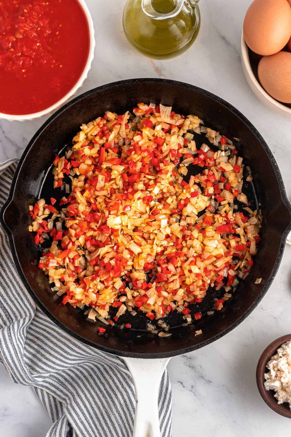 A skillet with the sautéed veggies.