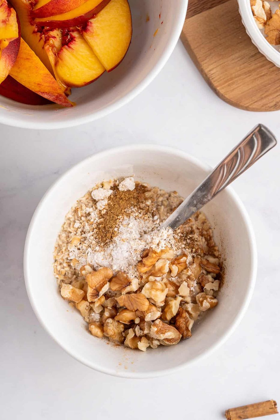 The dry ingredients being mixed in a bowl to create the topping. 