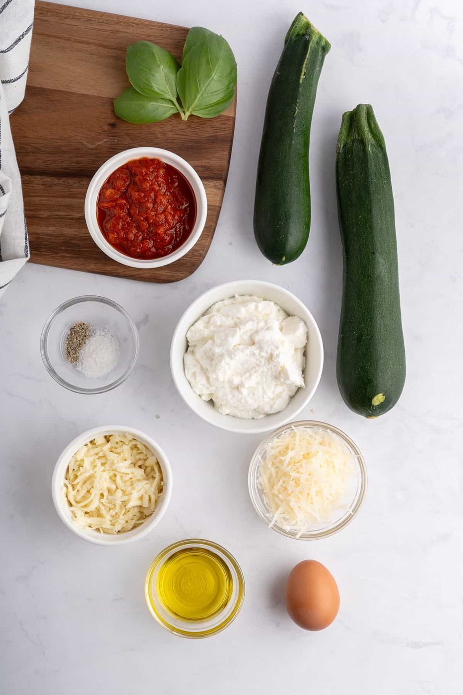 Photo of all of the ingredients needed to make these Zucchini Ricotta Rolls 