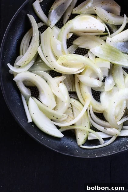 Perfectly caramelized onions, a sweet and savory base for the gourmet grilled cheese.