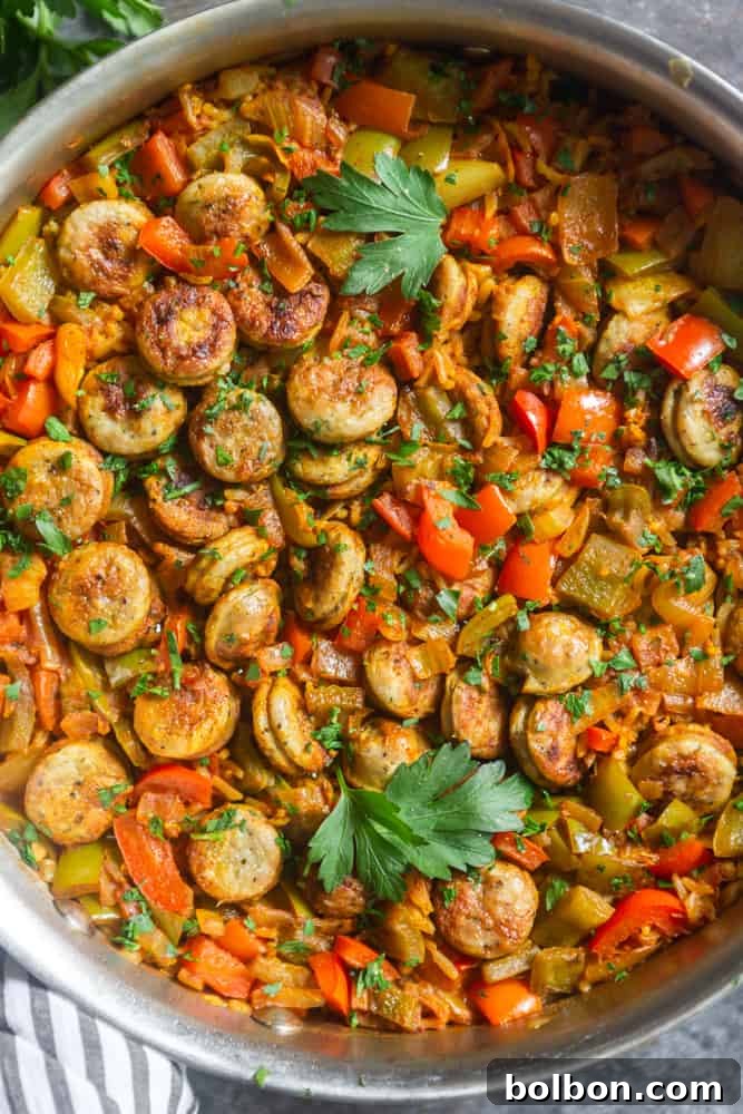 Closeup of the finished Easy One-Pot Sausage and Rice Skillet, garnished and ready to serve