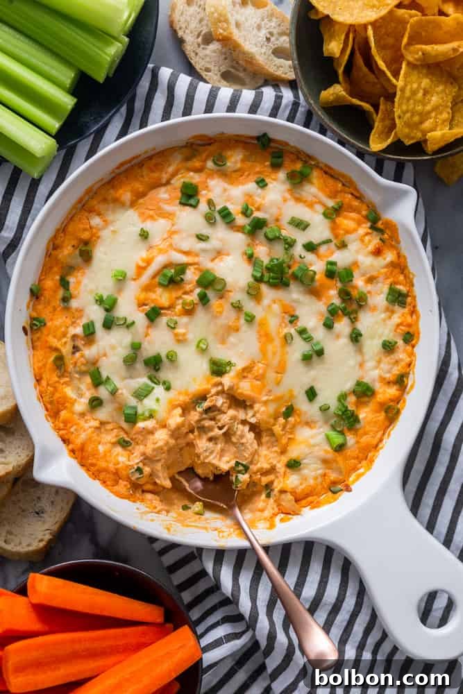 Buffalo Chicken Dip with dippers Baked Buffalo Chicken Dip served with a variety of dippers including carrots, celery, and tortilla chips