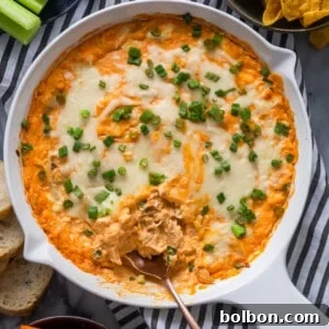 Delicious baked Buffalo Chicken Dip with crispy edges