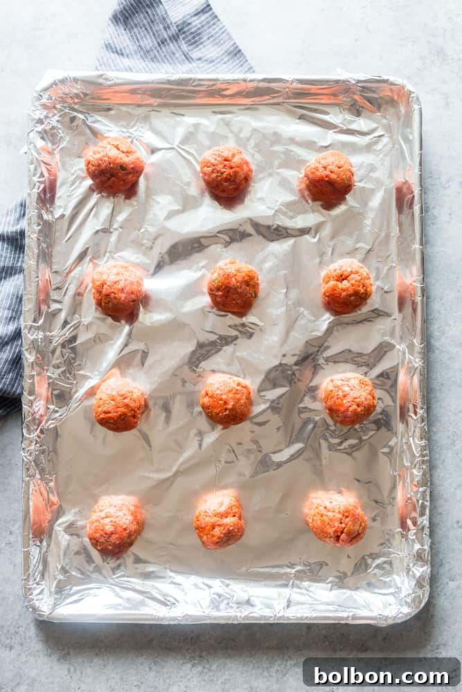 Korean Meatballs Made Easy 5 Sweet and spicy Gochujang meatballs ready to be served, perfect for a quick and flavorful meal.