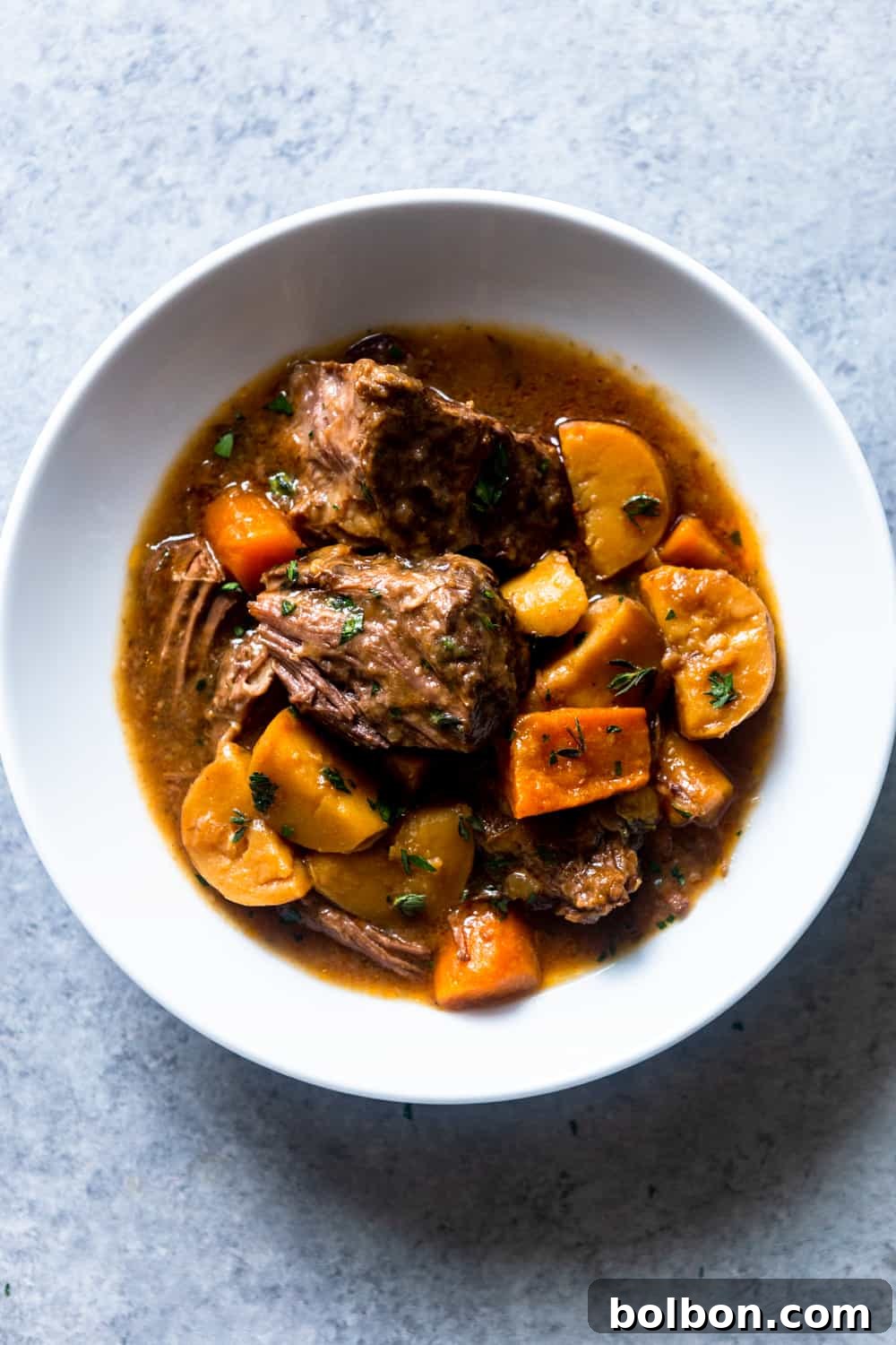 The final delicious serving of Slow Cooker Irish Beef Stew in a rustic bowl.