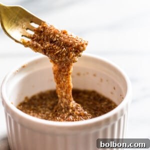 Prepared flax egg in a white bowl ready for baking.