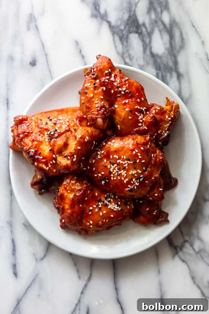 Korean Chicken Thighs on a white plate