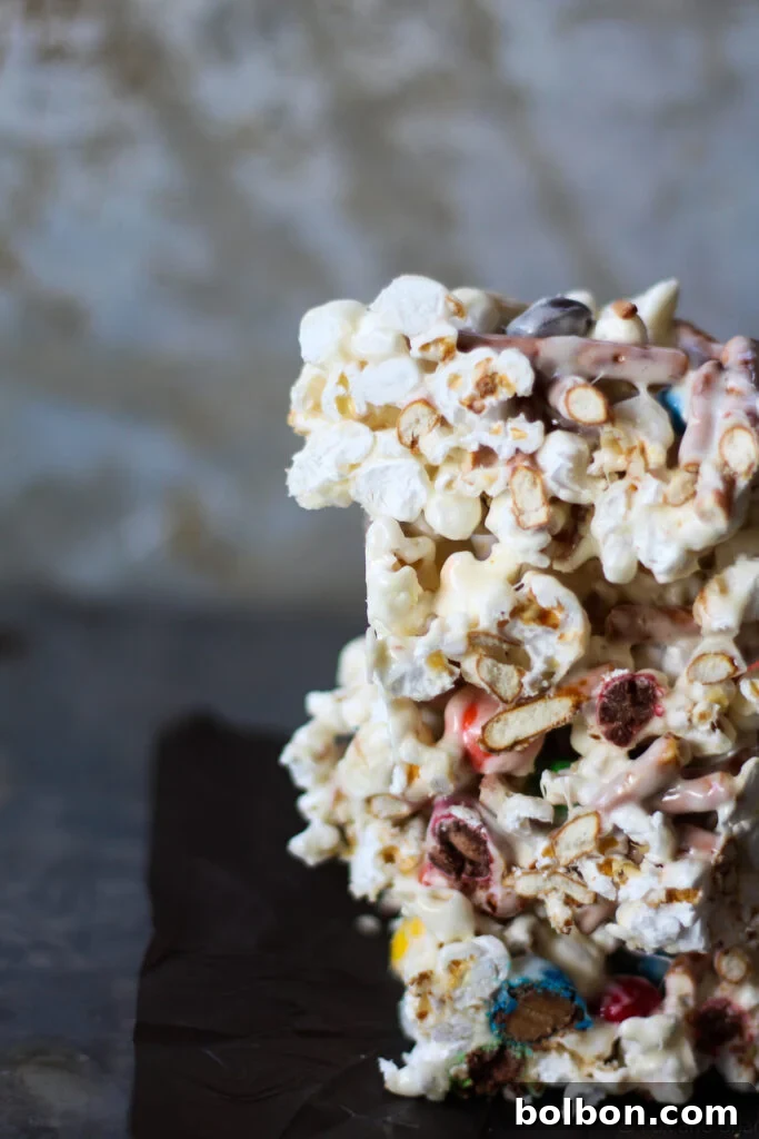Marshmallow popcorn bars that are stuffed with treats. Plus I made you a playlist!
