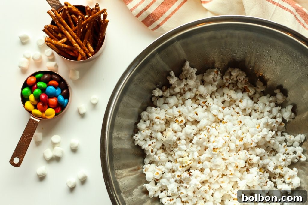 Marshmallow popcorn bars that are stuffed with treats. Plus I made you a playlist!