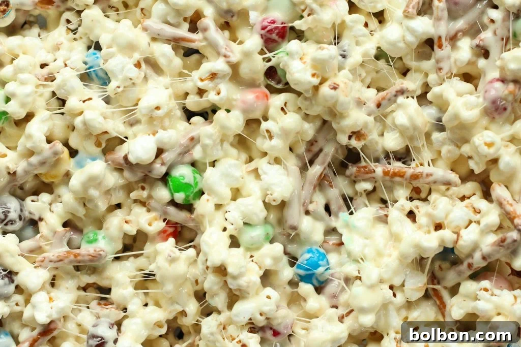 Marshmallow popcorn bars that are stuffed with treats. Plus I made you a playlist!