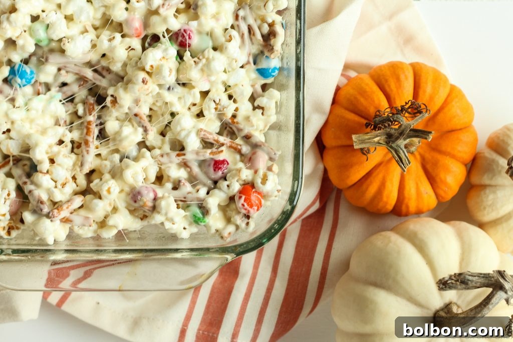 Marshmallow popcorn bars that are stuffed with treats. Plus I made you a playlist!