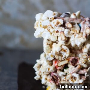 Marshmallow popcorn bars that are stuffed with treats. Plus I made you a playlist!