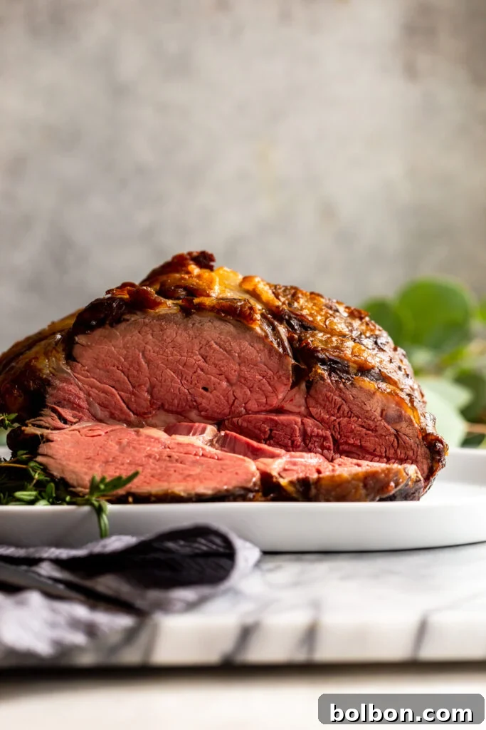 Slow Roasted prime rib sliced showing pink interior.