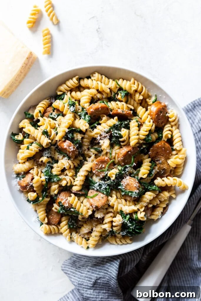 A vibrant bowl of 20-minute sausage and mushroom pasta, showcasing a healthy and quick weeknight meal.