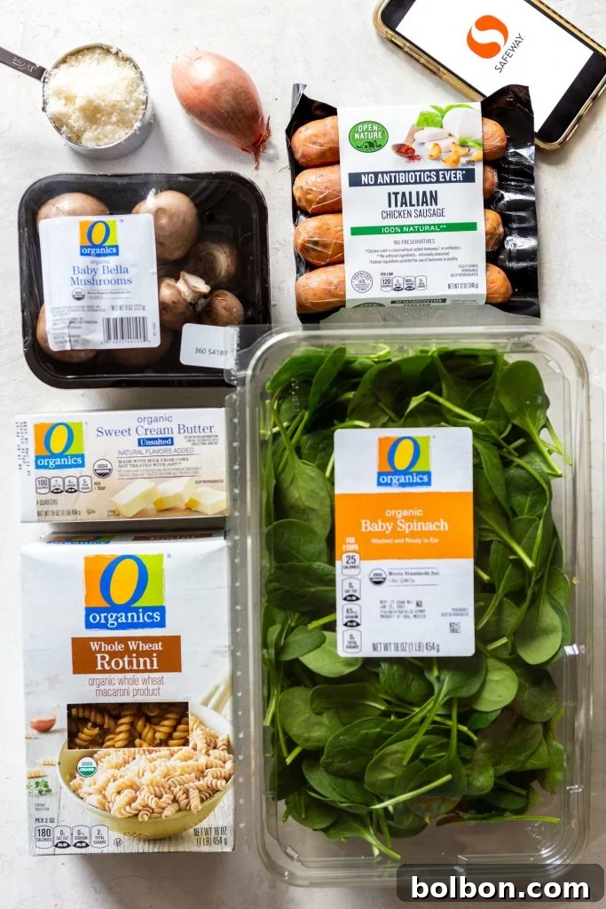 A close-up view of the ingredients for sausage and mushroom pasta before cooking, highlighting freshness.