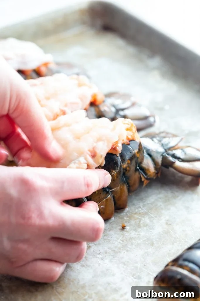 Image showing the lobster meat pulled up and resting on top of the shell