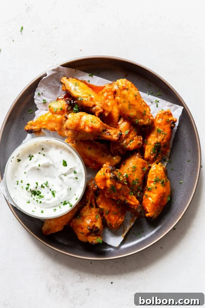 Various buffalo chicken wing sauces in small bowls