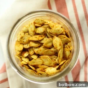 Crispy curry roasted pumpkin seeds ready to be served.
