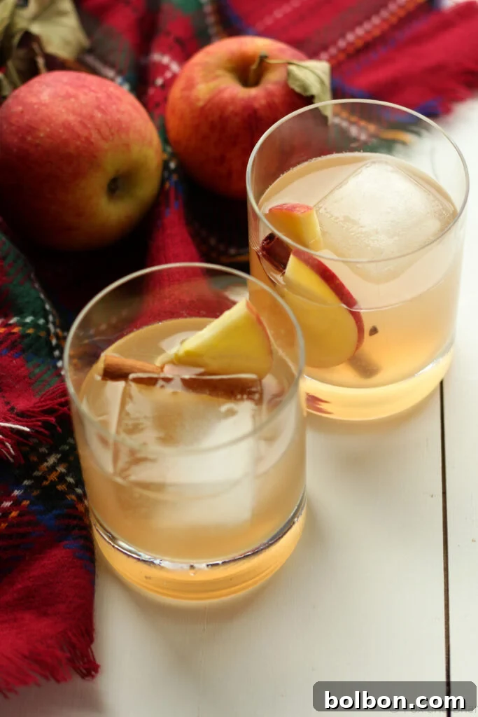 Harvest Maple Whiskey Cider 8 Clear large ice cubes in a lowball glass, ready for a fall cocktail.