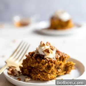Baked Pumpkin Oatmeal with a rich, inviting texture and golden-brown top