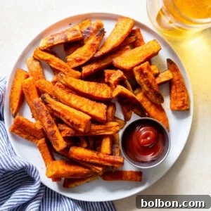 A dish of perfectly crispy oven-baked sweet potato fries.