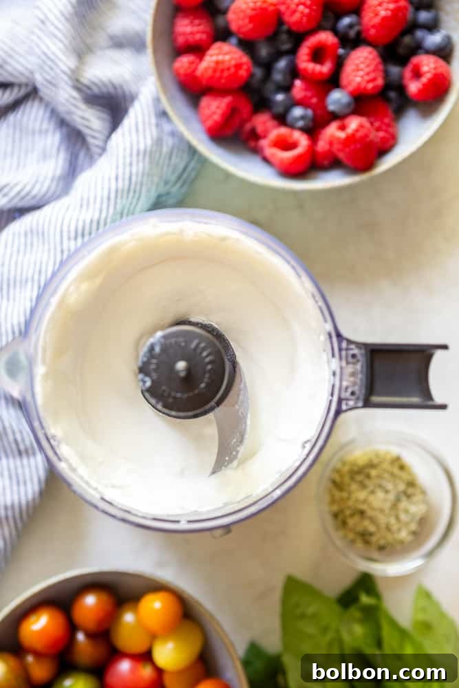 Whipped cottage cheese in a mini food processor being prepared