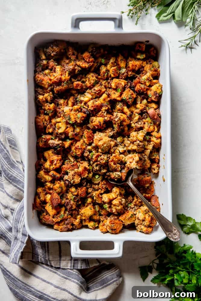 Timeless Savory Sausage Stuffing 2 Classic sausage stuffing in a white baking dish, ready to serve.