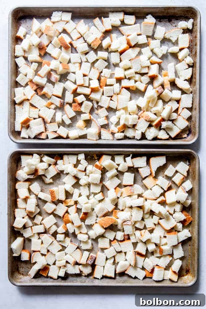 Timeless Savory Sausage Stuffing 3 Plain white sandwich bread cubed and ready for toasting.