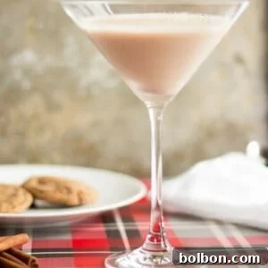 Gingerbread Martini Melodies 6 Close-up of a festive Gingerbread Martini garnished with fresh nutmeg.