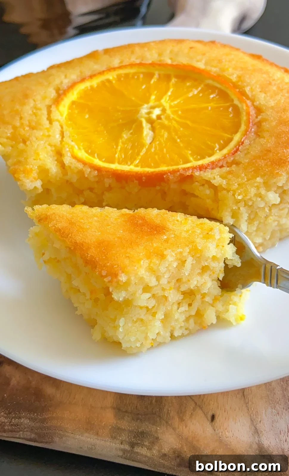 Golden Syrup Semolina Delight 2 Slice of Revani Cake, showcasing its moist, syrupy texture and golden color.