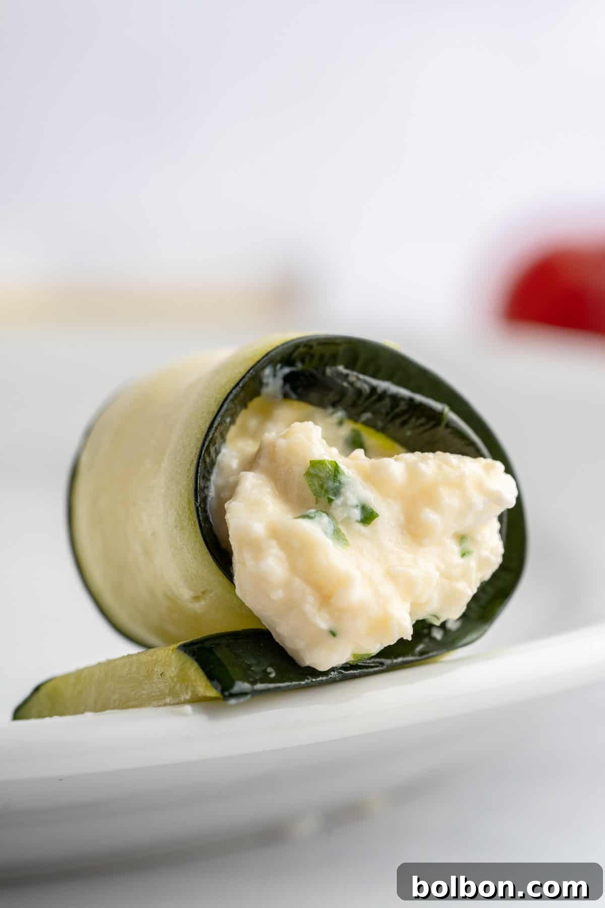 A photo of the zucchini rolled up. 