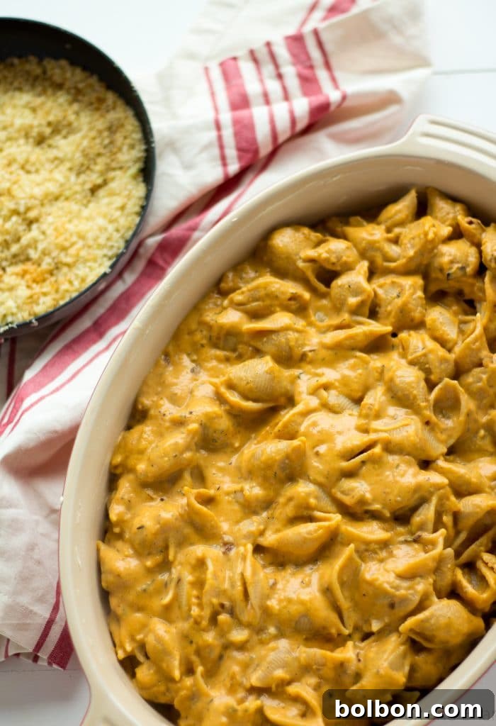 Making the creamy Pumpkin Mac and Cheese sauce