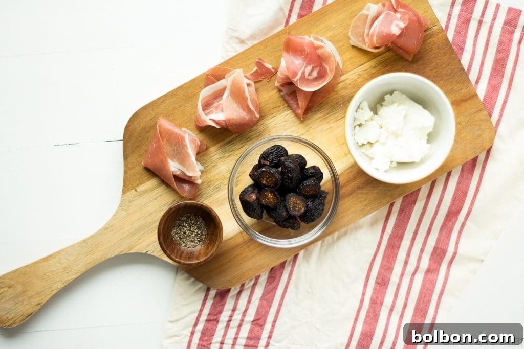 Fig, Prosciutto, and Creamy Chèvre Crostini 5 Close-up of Fig, Goat Cheese, and Prosciutto Bruschetta, ready to eat