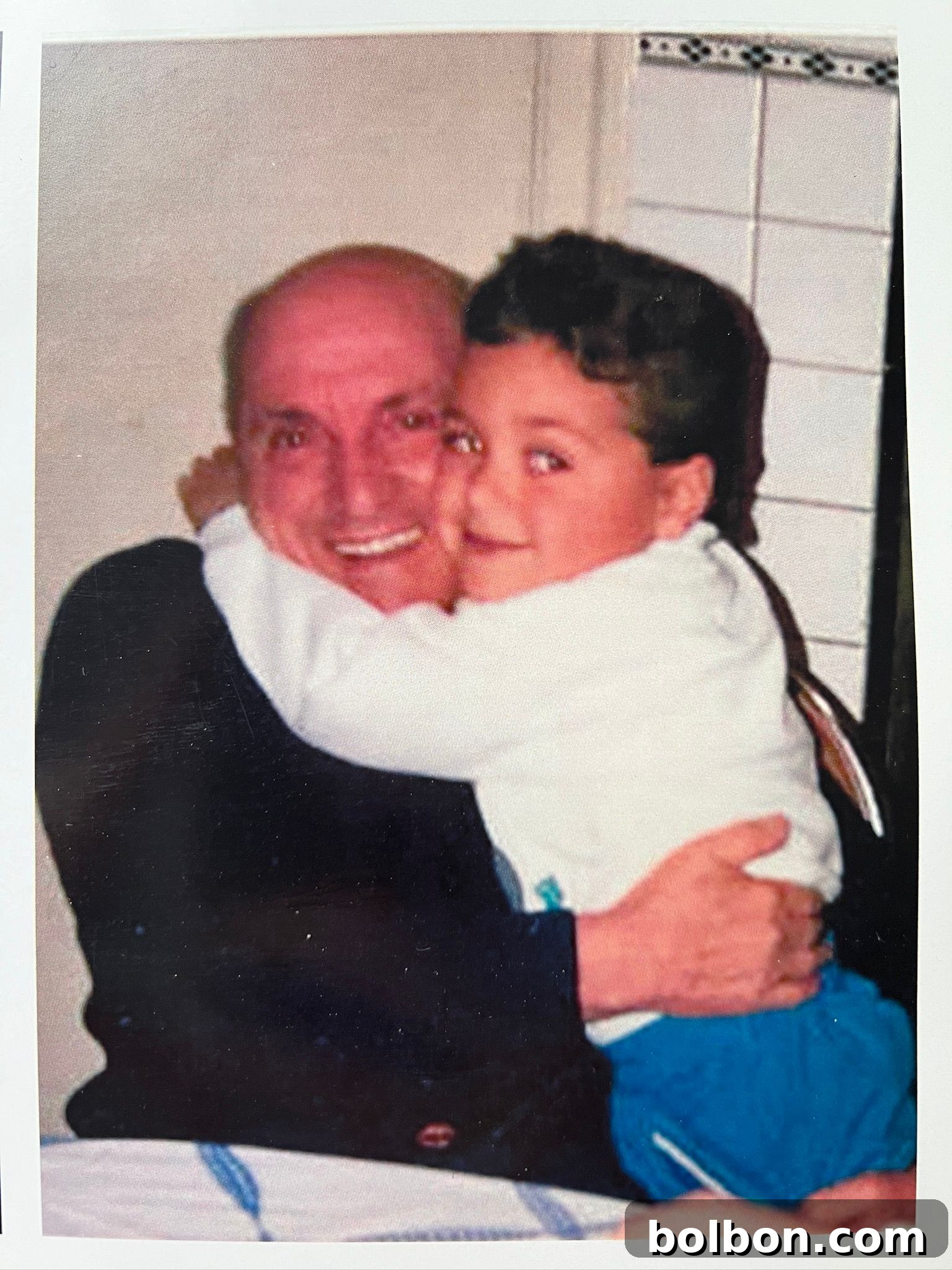 Little Pasta Wonders 4 Steve and Nonno Giovanni share a heartwarming moment, capturing the essence of intergenerational connection and shared culinary heritage.