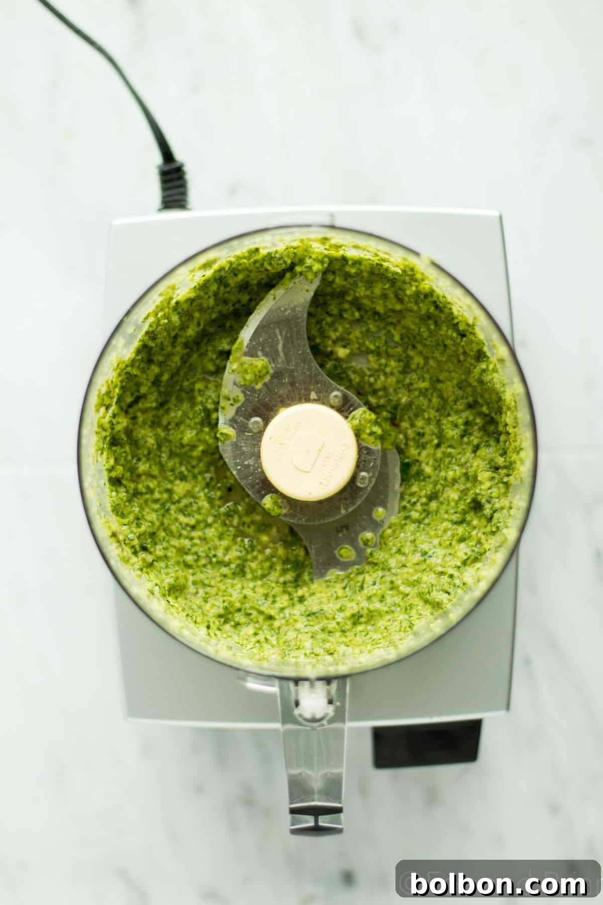 Fresh herb paste, rich with garlic and lemon, prepared for lamb.