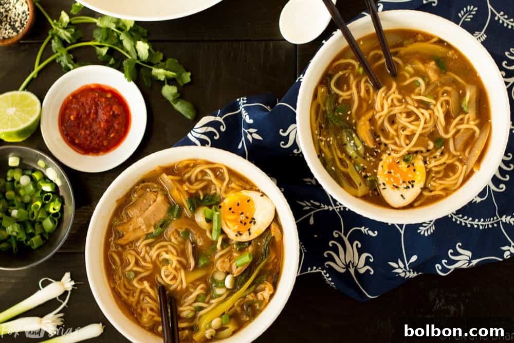 Quick Homemade Chicken Ramen 2 Easy Chicken Ramen with a perfectly cooked ramen egg, fresh noodles, and tender chicken in a rich broth.