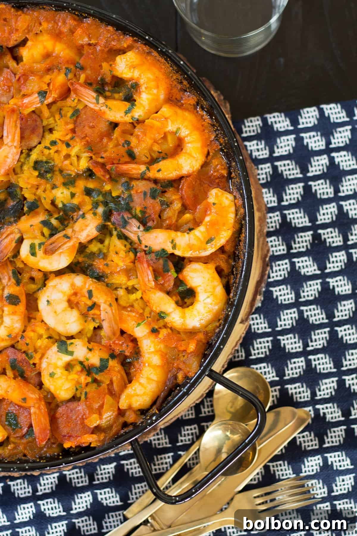Saffron-Infused Shrimp and Chorizo Paella 7 This spanish dish Paella is easy to make, has classic Spanish paella ingredients and is an impressive crowd pleaser.