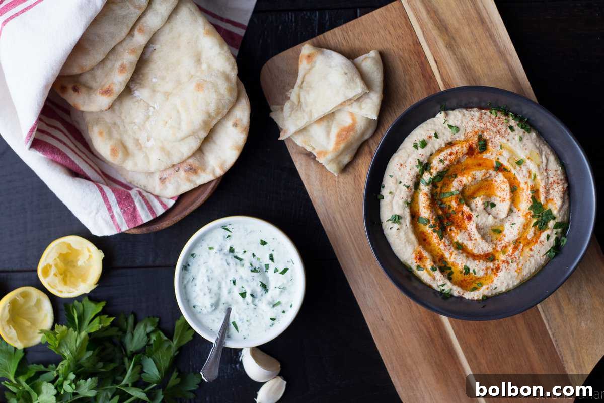 Close-up of fluffy homemade pita bread on a baking stone