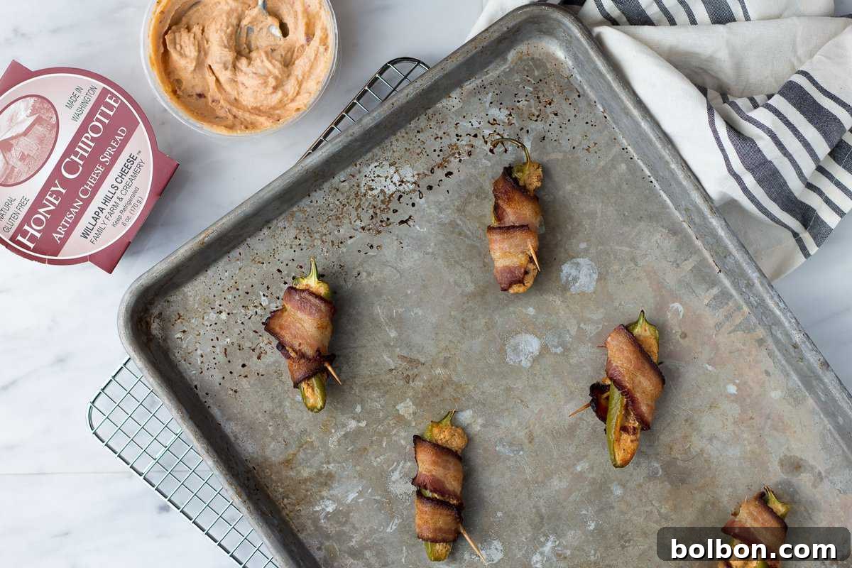 A large platter filled with honey chipotle jalapeno poppers, perfect for sharing.