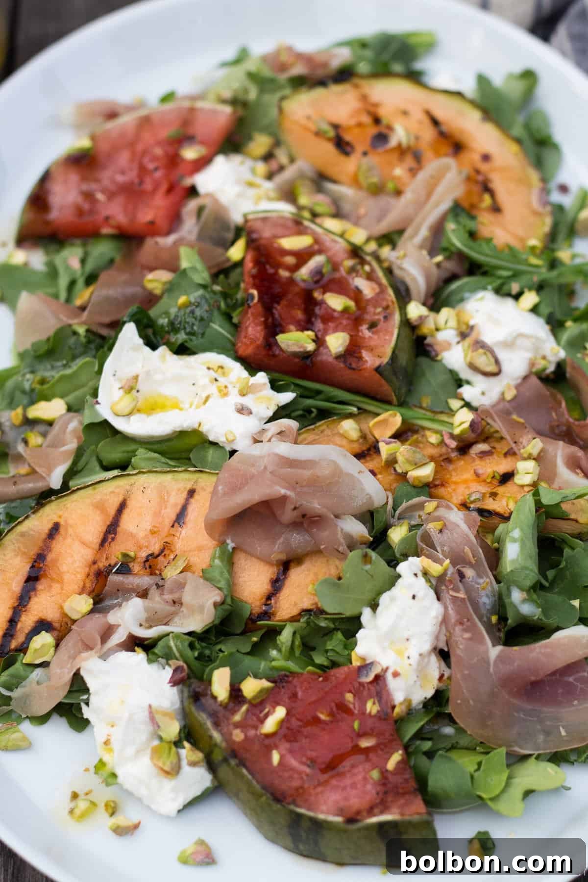 Final plated Grilled Melon Salad, ready to be enjoyed as a refreshing summer dish