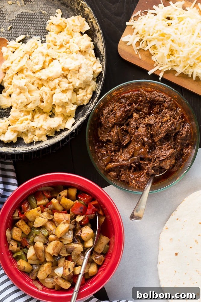 Close-up of a perfectly wrapped Make-Ahead Beef Breakfast Burrito, showcasing the filling of shredded beef, eggs, and potatoes.