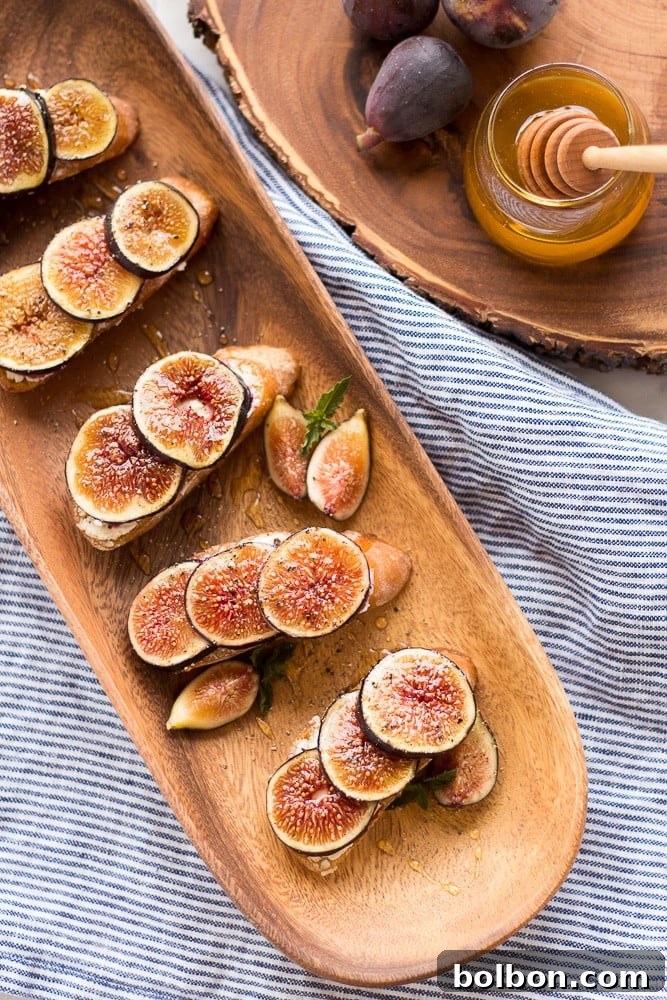 Honeyed Fig and Chevre Crostini 10 A large platter of Fig and Goat Cheese Crostini with Honey, ready for serving.