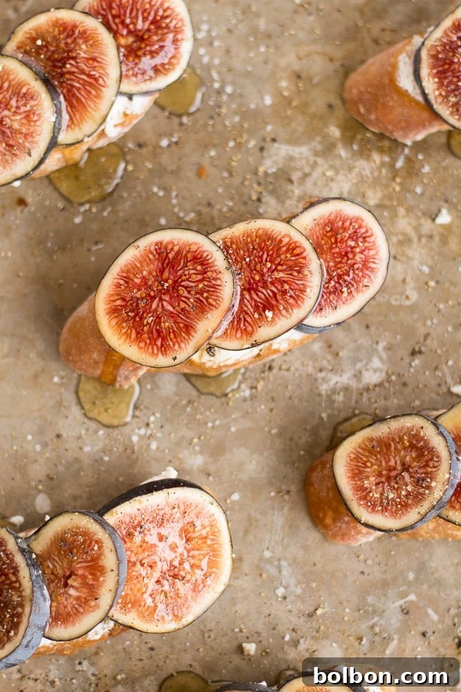 Honeyed Fig and Chevre Crostini 5 Hand drizzling honey over Fig and Goat Cheese Crostini.