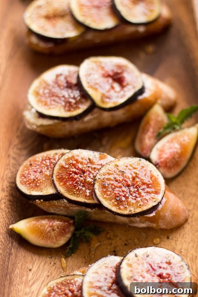 Honeyed Fig and Chevre Crostini 6 Beautifully plated Fig and Goat Cheese Crostini, ready for a summer gathering.
