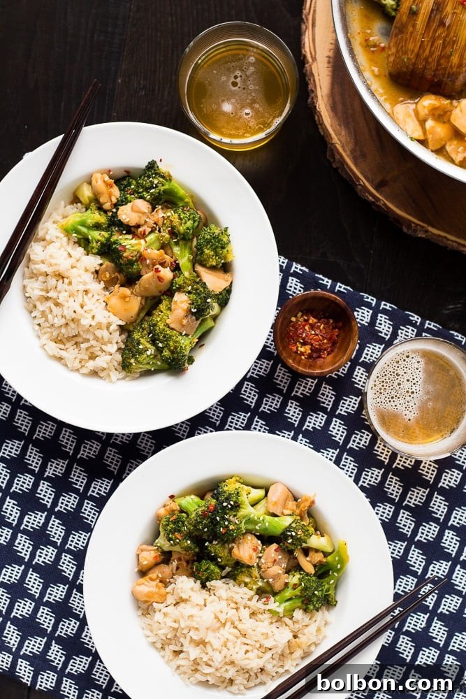Close-up of One Pan Orange Chicken and Broccoli with a rich sauce