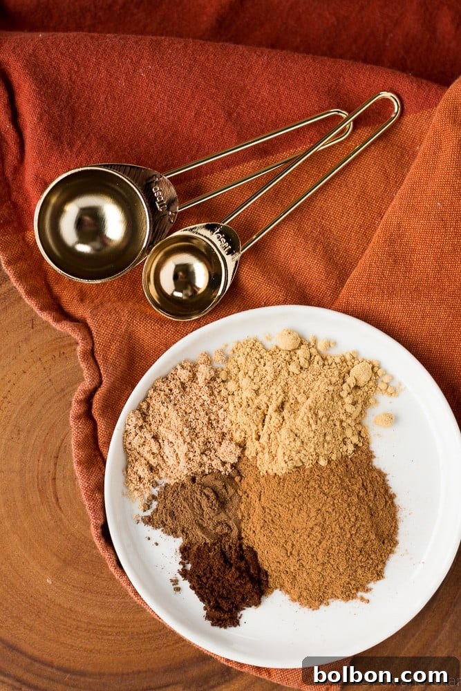 This pumpkin pie spice mix is so easy to make, and so much better than the store bought version! Just five spices will make all your fall baking complete!