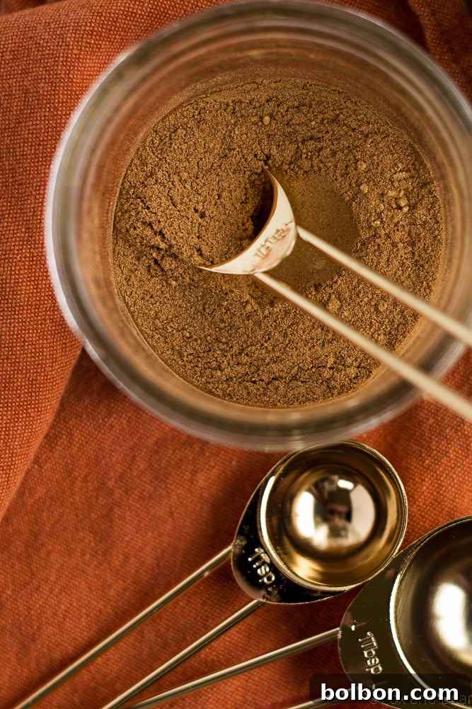 This pumpkin pie spice mix is so easy to make, and so much better than the store bought version! Just five spices will make all your fall baking complete!